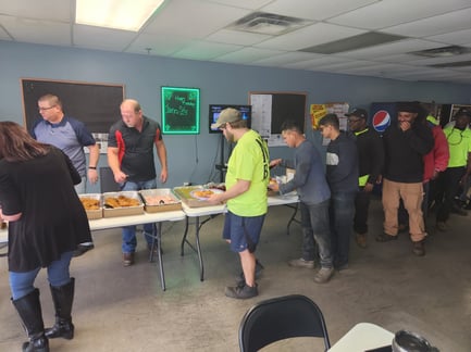 team members lining up at safety celebration luncheon