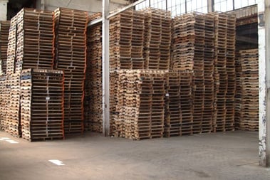 stacks of recycled pallets